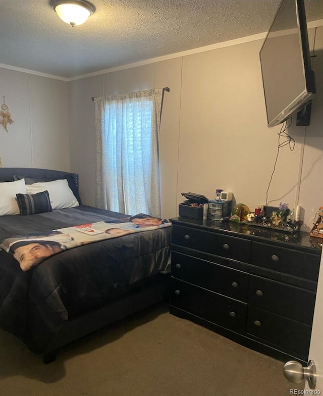 431 N 35th Ave Unit 51, Greeley, CO 80631 - carpeted bedroom with ornamental molding and a textured ceiling