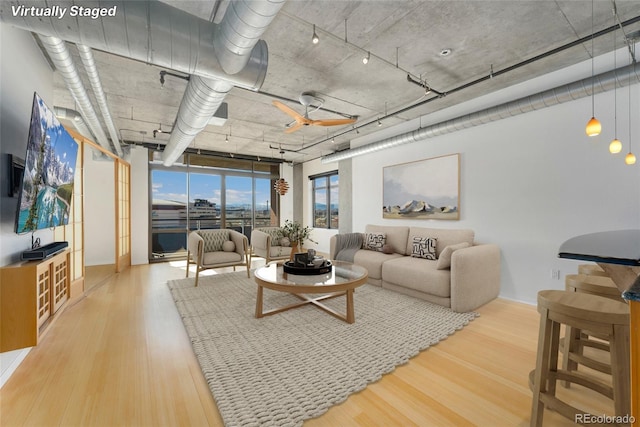 living area with wood finished floors