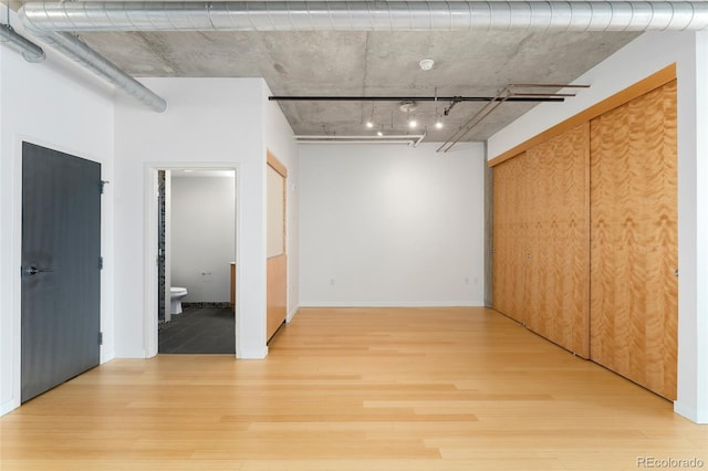 unfurnished room featuring light wood-type flooring