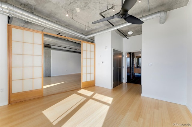 unfurnished bedroom featuring wood finished floors