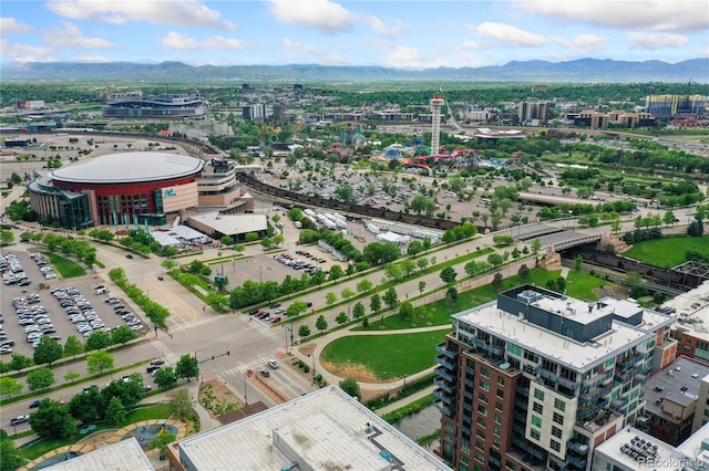 birds eye view of property with a mountain view