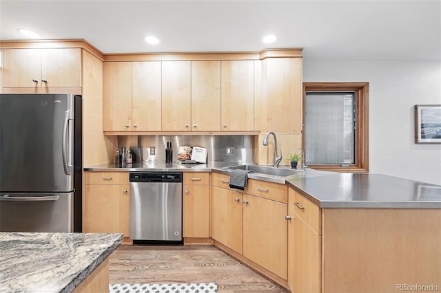 11 S Albion St, Denver, CO 80246 - kitchen with stainless steel countertops, stainless steel appliances, light brown cabinetry, and recessed lighting