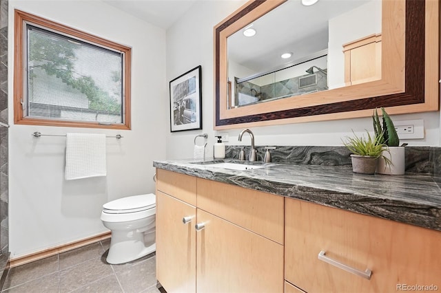 11 S Albion St, Denver, CO 80246 - full bath with toilet, vanity, a shower with door, tile patterned flooring, and recessed lighting