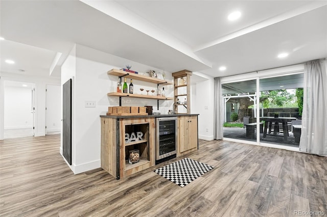 11 S Albion St, Denver, CO 80246 - indoor wet bar featuring wine cooler, light wood-style flooring, baseboards, and recessed lighting