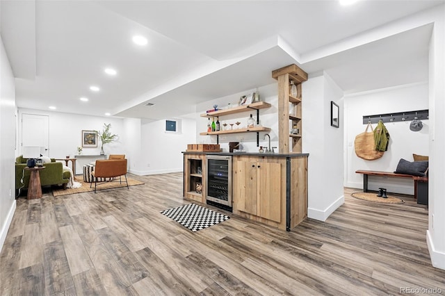 11 S Albion St, Denver, CO 80246 - indoor wet bar featuring beverage cooler, wood finished floors, baseboards, and recessed lighting