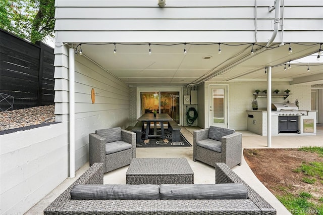 11 S Albion St, Denver, CO 80246 - view of patio / terrace with outdoor lounge area, a grill, and washer / clothes dryer