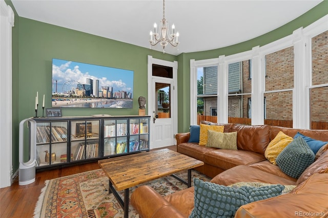 1154 N Clarkson St, Denver, CO 80218 - living area with a chandelier and wood finished floors