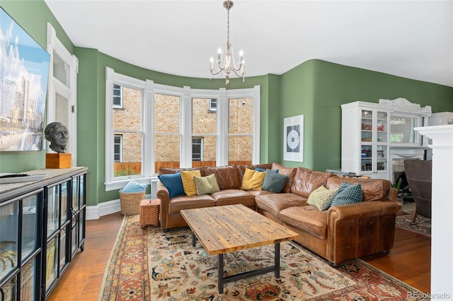 1154 N Clarkson St, Denver, CO 80218 - living area with a chandelier and wood finished floors