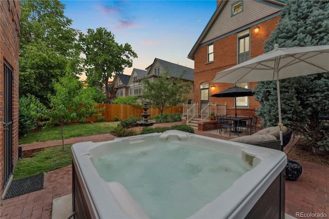 1154 N Clarkson St, Denver, CO 80218 - view of patio / terrace featuring a hot tub