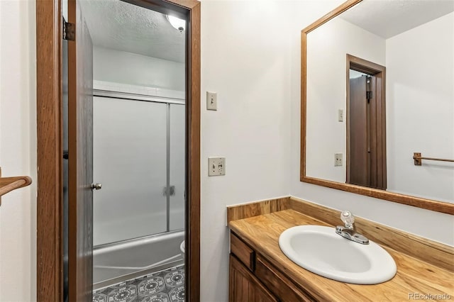 675 Straight Creek Dr Unit 301, Dillon, CO 80435 - full bathroom featuring vanity and enclosed tub / shower combo