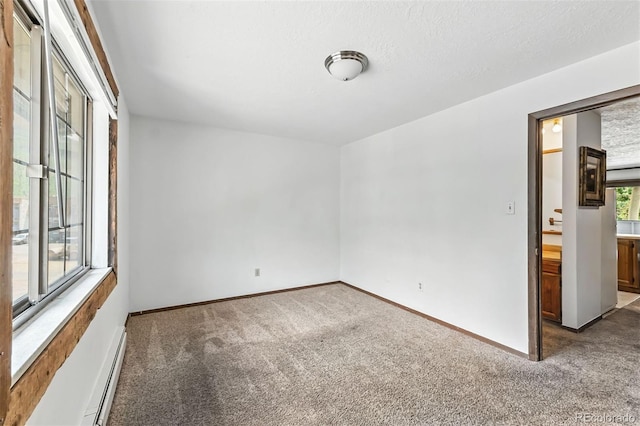 675 Straight Creek Dr Unit 301, Dillon, CO 80435 - carpeted spare room with baseboard heating and baseboards