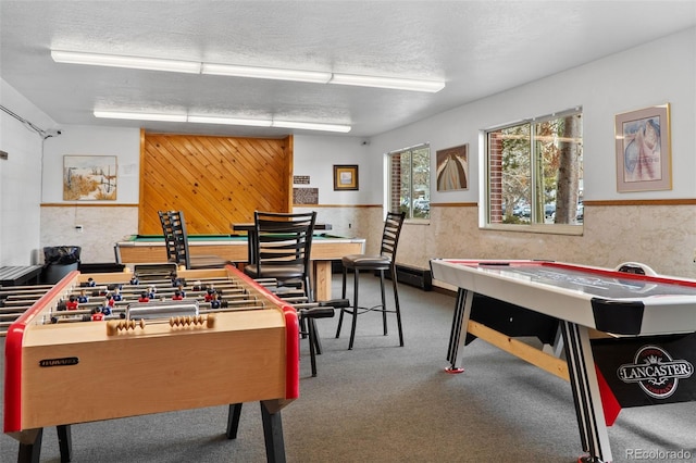 675 Straight Creek Dr Unit 301, Dillon, CO 80435 - playroom with wainscoting, carpet flooring, and a textured ceiling