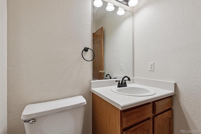 13457 Glen Cir, Broomfield, CO 80020 - bathroom featuring vanity and a textured wall
