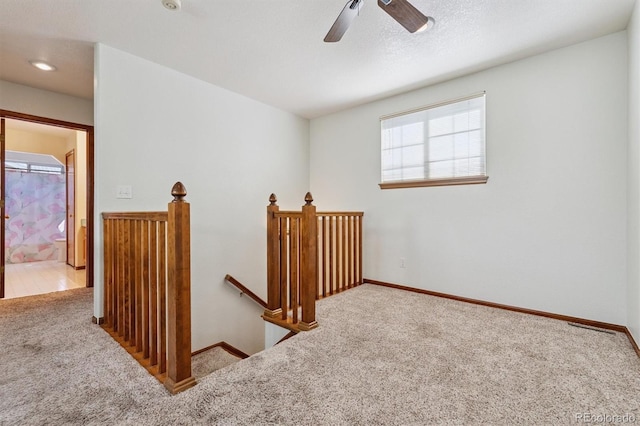 13457 Glen Cir, Broomfield, CO 80020 - carpeted spare room with ceiling fan and baseboards