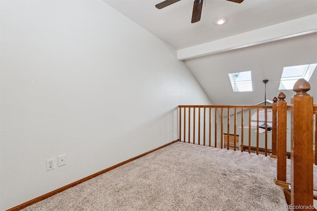 13457 Glen Cir, Broomfield, CO 80020 - empty room featuring a skylight, a ceiling fan, carpet floors, and lofted ceiling