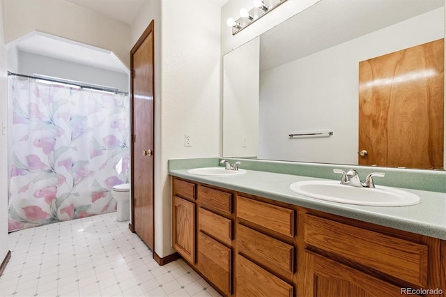 13457 Glen Cir, Broomfield, CO 80020 - full bathroom with double vanity and toilet