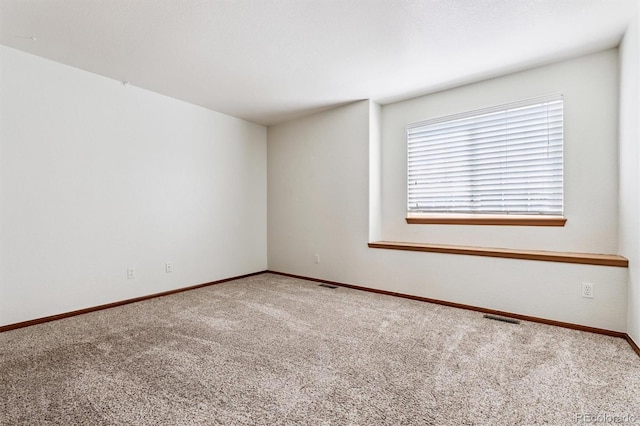 13457 Glen Cir, Broomfield, CO 80020 - carpeted spare room featuring baseboards