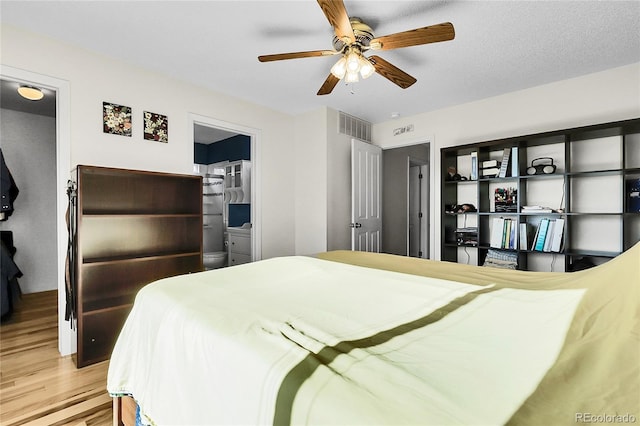 2659 S Halifax St, Aurora, CO 80013 - bedroom featuring light wood finished floors and ceiling fan