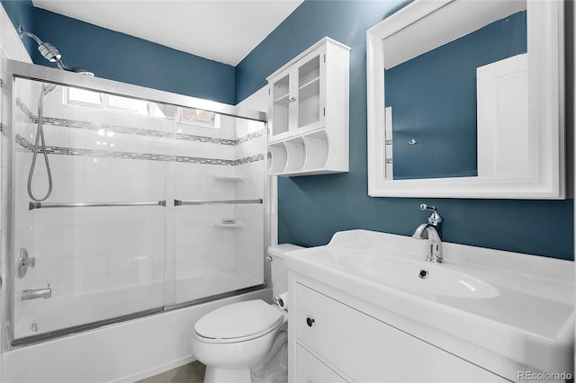 2659 S Halifax St, Aurora, CO 80013 - bathroom featuring vanity and combined bath / shower with glass door