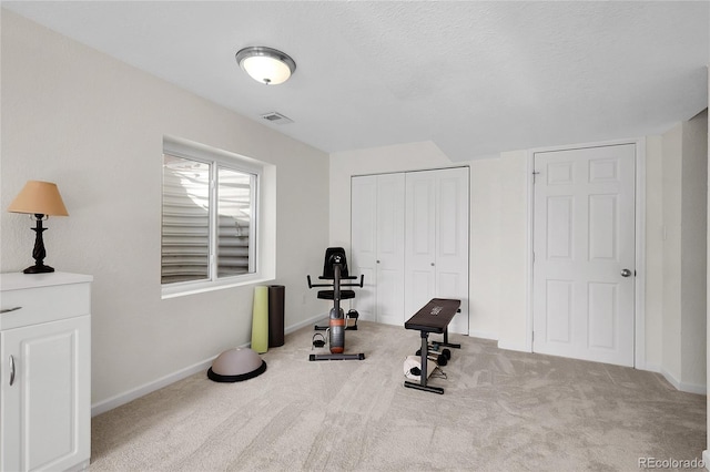 2659 S Halifax St, Aurora, CO 80013 - exercise room featuring carpet floors and baseboards