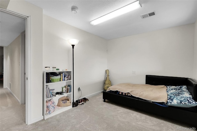 2659 S Halifax St, Aurora, CO 80013 - carpeted bedroom featuring baseboards