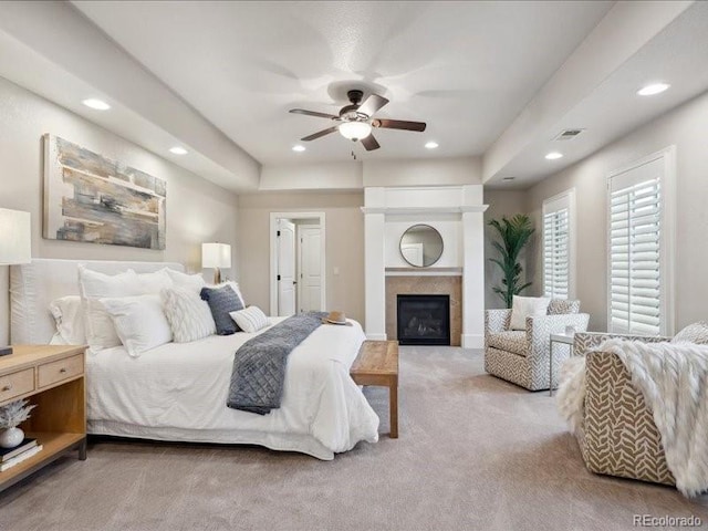 carpeted bedroom featuring ceiling fan