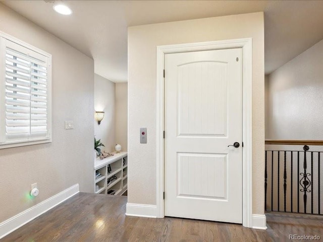 hall featuring dark hardwood / wood-style flooring