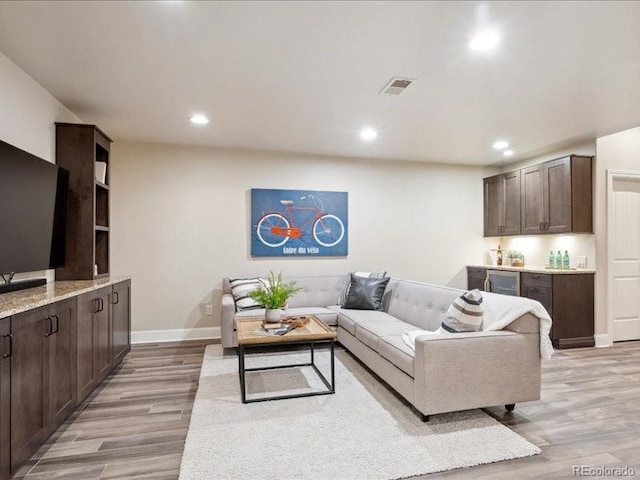 living room featuring light hardwood / wood-style flooring