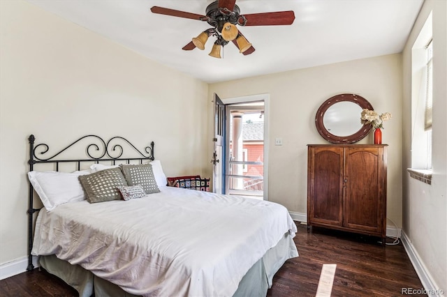 bedroom with ceiling fan and dark hardwood / wood-style floors