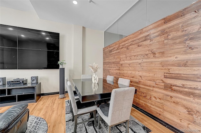 dining space with light hardwood / wood-style floors