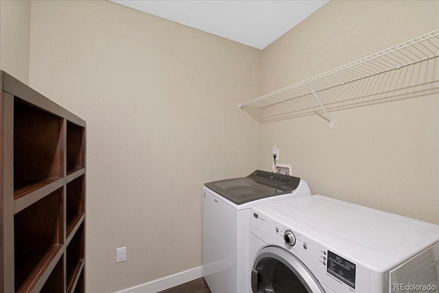 laundry room with separate washer and dryer