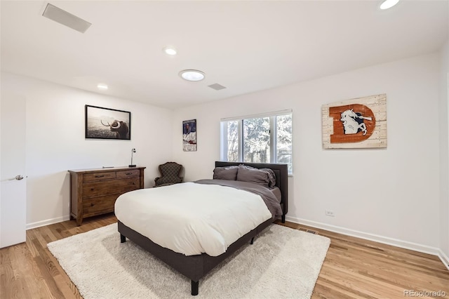 bedroom featuring light hardwood / wood-style floors