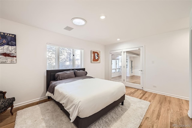 2 Elm St, Denver, CO 80220 - bedroom featuring light wood finished floors, access to exterior, baseboards, and recessed lighting