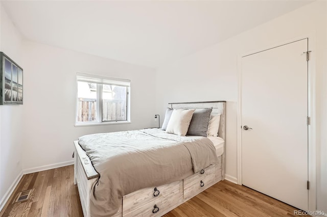 2 Elm St, Denver, CO 80220 - bedroom featuring light wood-type flooring and baseboards