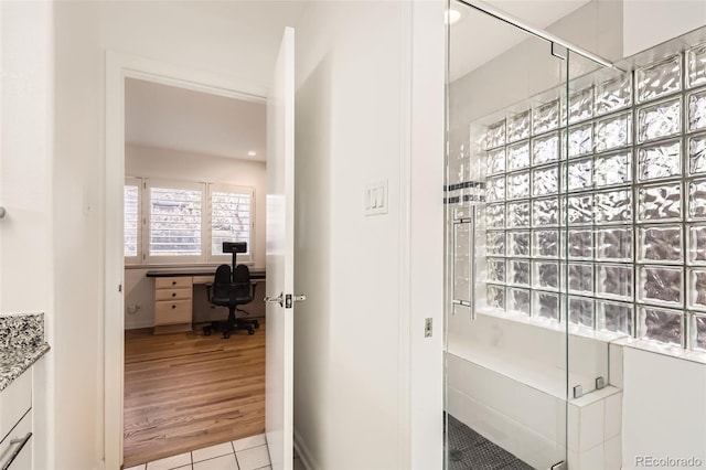 2 Elm St, Denver, CO 80220 - full bath with a stall shower, vanity, and tile patterned floors