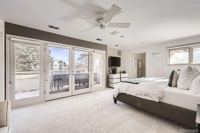 2 Elm St, Denver, CO 80220 - bedroom with light carpet, access to outside, and french doors