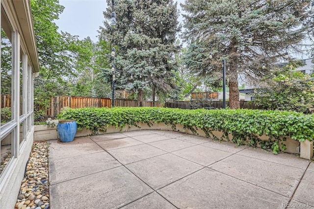 2 Elm St, Denver, CO 80220 - fenced backyard featuring a patio area