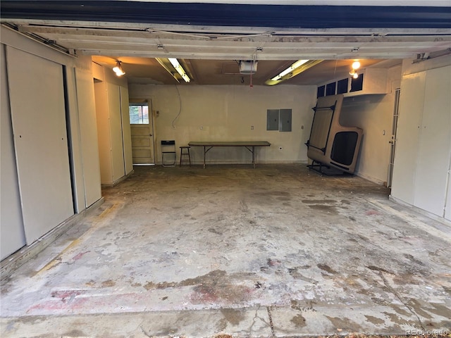 6948 W 70th Ave, Arvada, CO 80003 - garage with a garage door opener and electric panel