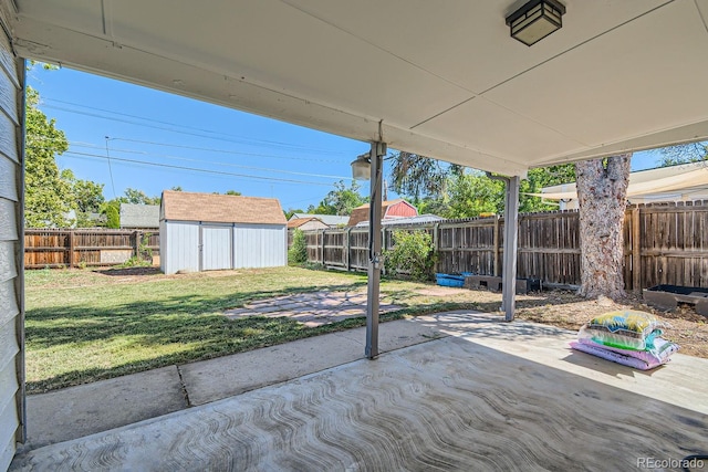 view of patio featuring a storage unit