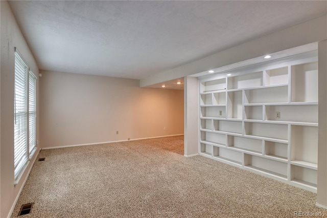 10320 E Jewell Ave Unit 63, Aurora, CO 80247 - carpeted empty room with healthy amount of natural light, baseboards, and recessed lighting