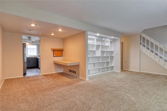 10320 E Jewell Ave Unit 63, Aurora, CO 80247 - unfurnished living room featuring carpet flooring, recessed lighting, baseboards, and an office area