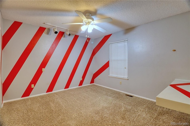 10320 E Jewell Ave Unit 63, Aurora, CO 80247 - carpeted spare room with a ceiling fan, track lighting, and a textured ceiling