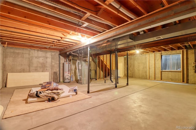 10320 E Jewell Ave Unit 63, Aurora, CO 80247 - unfinished basement featuring gas water heater and heating unit