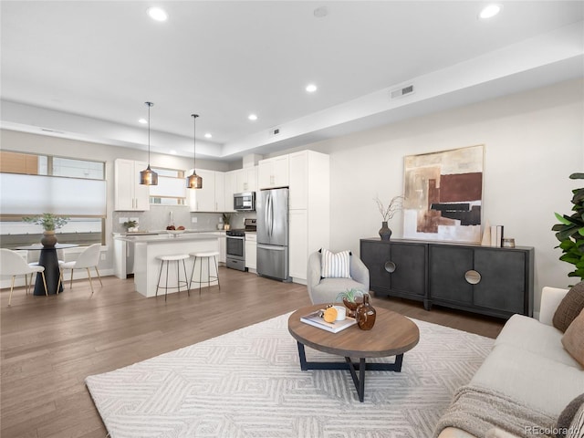 living room featuring hardwood / wood-style flooring