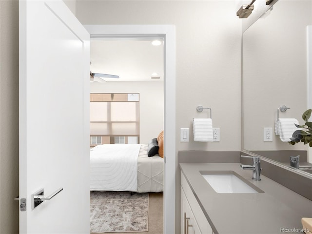 bathroom with vanity and ceiling fan