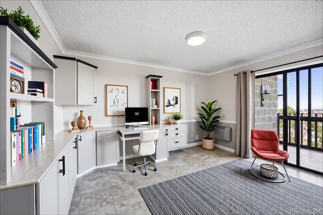 home office with built in desk, a textured ceiling, ornamental molding, and light tile patterned flooring