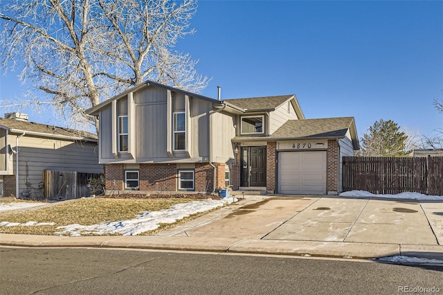 view of front of property featuring a garage