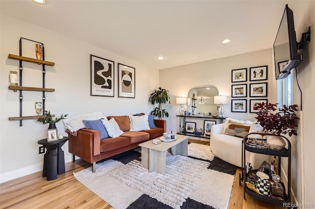 living room with light hardwood / wood-style floors