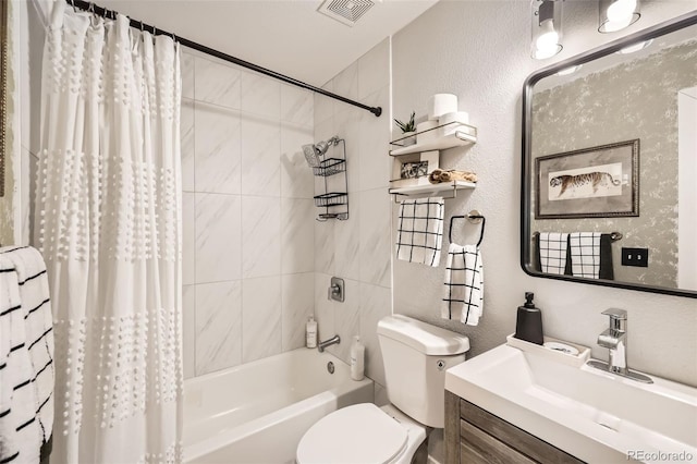 full bathroom featuring toilet, vanity, and shower / bath combo with shower curtain