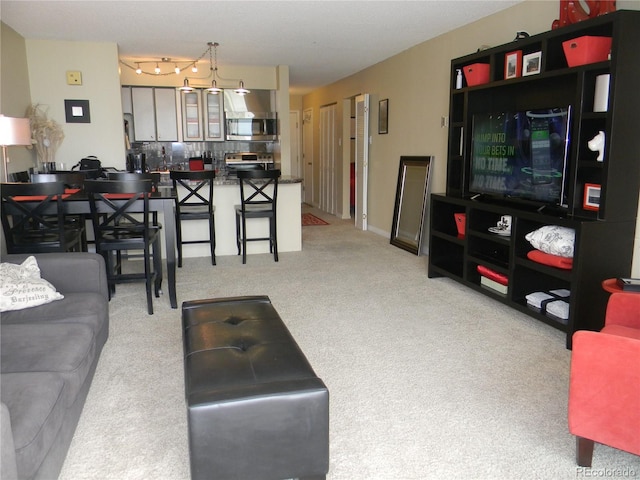 living room with light colored carpet